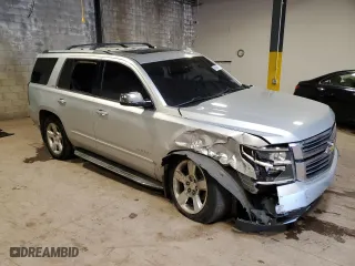 2015 Chevrolet Tahoe LTZ with VIN 1GNSKCKC3FR592128, listed as a Copart auction lot 49469345 with 0 mi miles and Salvage Title. Bid and sale history available at carsss.com. Image 4.