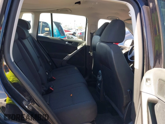 2010 Volkswagen Tiguan with VIN WVGAV9AX6AW000410, listed as a IAAI auction lot 41446852 with 118,728 mi miles and . Bid and sale history available at DreamBid. Image 8.