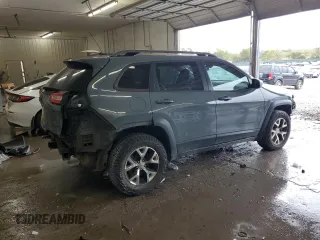 2014 Jeep Cherokee Trailhawk z VIN 1C4PJMBB0EW309277, wystawiony jako Copart lot #52370565 z przebiegiem 148 924 mil mil oraz Czysty tytuł • Clean title. Historia ofert i sprzedaży dostępna na DreamBid. Obrazek 3.