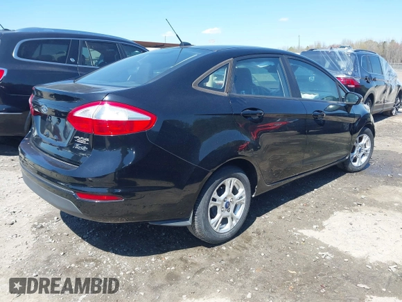 2016 Ford Fiesta SE with VIN 3FADP4BJ9GM144119, listed as a IAAI auction lot 41882179 with 122,048 mi miles. Bid and sale history available at carsss.com. Image 4.