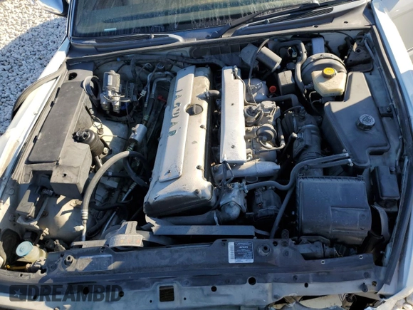 1995 Jaguar XJ with VIN SAJKX1745SC739290, listed as a Copart auction lot 82887524 with Not provided miles and Salvage title. Bid and sale history available at DreamBid. Image 12.