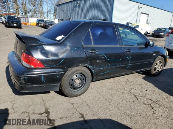 2002 Mitsubishi Lancer OZ-Rally z VIN JA3AJ86E92U027551, wystawiony jako Copart lot #45020575 z przebiegiem 214 575 mil mil oraz Szkoda całkowita • Salvage title. Historia ofert i sprzedaży dostępna na DreamBid. Obrazek 3.