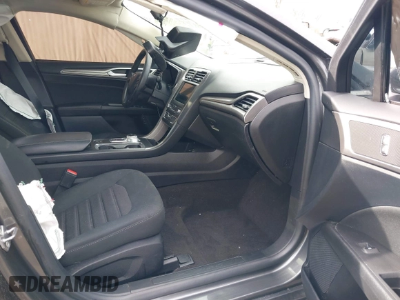 2020 Ford Fusion SE z VIN 3FA6P0LU6LR185721, wystawiony jako IAAI lot #41639827 z przebiegiem 63 857 mil mil oraz . Historia ofert i sprzedaży dostępna na DreamBid. Obrazek 5.
