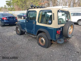 1995 Jeep Wrangler S with VIN 1J4FY19P5SP243137, listed as a IAAI auction lot 41787400 with 136,565 mi miles. Bid and sale history available at carsss.com. Image 3.