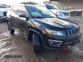 2019 Jeep Compass Trailhawk with VIN 3C4NJDDBXKT671364, listed as a IAAI auction lot 41655974 with 104,252 mi miles and . Bid and sale history available at carsss.com. Image 1.