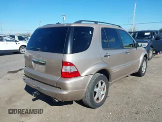 2002 Mercedes-Benz M 320/430/500 with VIN 4JGAB75E42A322824, listed as a IAAI auction lot 41871249 with 203,845 mi miles and . Bid and sale history available at carsss.com. Image 4.