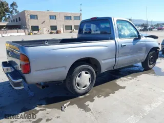 1998 Toyota Tacoma with VIN 4TANL42N8WZ136647, listed as a IAAI auction lot 41635748 with 218,836 mi miles. Bid and sale history available at carsss.com. Image 4.