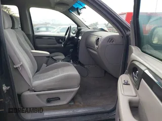 2005 GMC Envoy SLT with VIN 1GKDT13S352258833, listed as a IAAI auction lot 41525149 with 213,829 mi miles. Bid and sale history available at carsss.com. Image 5.