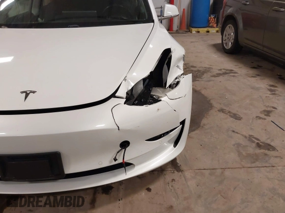 2018 Tesla Model 3 Long Range Battery with VIN 5YJ3E1EB5JF084446, listed as a IAAI auction lot 41209852 with 70,125 mi miles and . Bid and sale history available at DreamBid. Image 6.