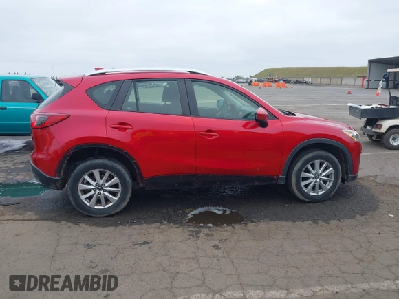2015 Mazda CX-5 Sport z VIN JM3KE2BE9F0452625, wystawiony jako IAAI lot #42114867 z przebiegiem 167 849 mil mil oraz . Historia ofert i sprzedaży dostępna na DreamBid. Obrazek 12.
