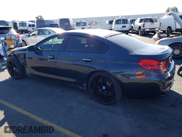 2015 BMW M6 z VIN WBS6C9C5XFD467854, wystawiony jako Copart lot #78871744 z przebiegiem 55 789 mil mil oraz Szkody całkowita. Historia ofert i sprzedaży dostępna na DreamBid. Obrazek 2.