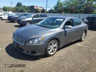 2014 Nissan Maxima SV with VIN 1N4AA5AP1EC463805, listed as a Copart auction lot 64357645 with 129,972 mi miles and Salvage title. Bid and sale history available at DreamBid. Image 1.