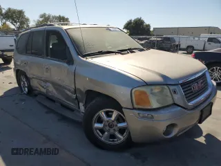 2003 GMC Envoy SLT with VIN 1GKDT13S832327481, listed as a Copart auction lot 72253474 with Not Provided miles and Salvage Title. Bid and sale history available at DreamBid. Image 4.