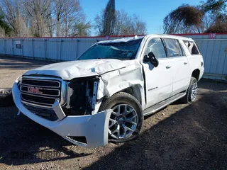 2019 GMC Yukon XL SLT with VIN 1GKS1GKC1KR335082, listed as a IAAI auction lot 41652504 with 135,824 mi miles. Bid and sale history available at carsss.com. Image 6.