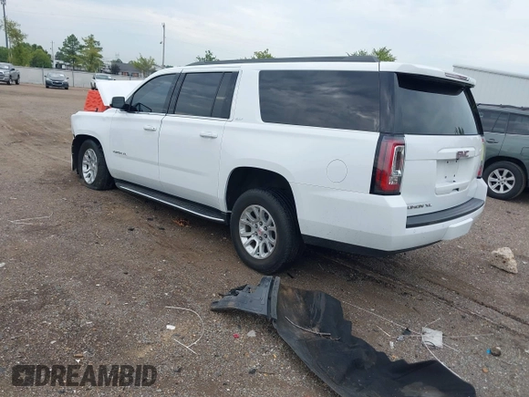 2019 GMC Yukon XL SLT with VIN 1GKS2GKC2KR369285, listed as a IAAI auction lot 40279008 with Not Provided miles and . Bid and sale history available at DreamBid. Image 3.
