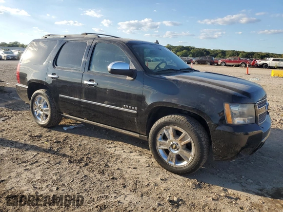 2010 Chevrolet Tahoe LTZ with VIN 1GNUKCE00AR105129, listed as a Copart auction lot 72955014 with 197,431 mi miles and Salvage title. Bid and sale history available at DreamBid. Image 4.