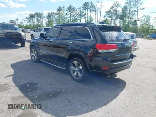 2014 Jeep Grand Cherokee Overland with VIN 1C4RJECG8EC417995, listed as a IAAI auction lot 41959550 with 155,029 mi miles. Bid and sale history available at carsss.com. Image 3.