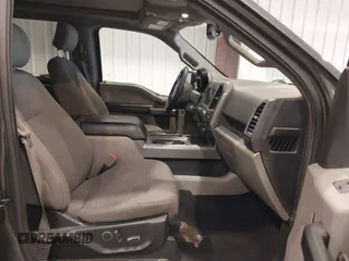 2018 Ford F-150 XL with VIN 1FTEW1EG3JKE52823, listed as a IAAI auction lot 41413009 with 142,057 mi miles. Bid and sale history available at carsss.com. Image 5.
