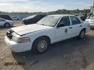 2005 Ford Police Interceptor with VIN 2FAHP71W55X174056, listed as a Copart auction lot 55501955 with 330,613 mi miles and Salvage title. Bid and sale history available at DreamBid. Image 1.