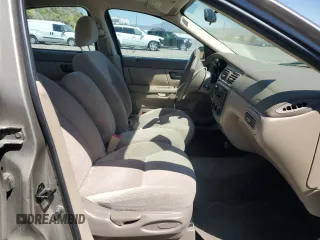 2003 Ford Taurus LX Standard z VIN 1FAFP52U63G277370, wystawiony jako Copart lot #56184345 z przebiegiem 115 778 mil mil oraz Szkoda całkowita • Salvage title. Historia ofert i sprzedaży dostępna na DreamBid. Obrazek 7.
