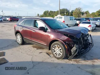 2018 Cadillac XT5 FWD with VIN 1GYKNARS6JZ179706, listed as a IAAI auction lot 41195570 with 80,676 mi miles. Bid and sale history available at carsss.com. Image 1.