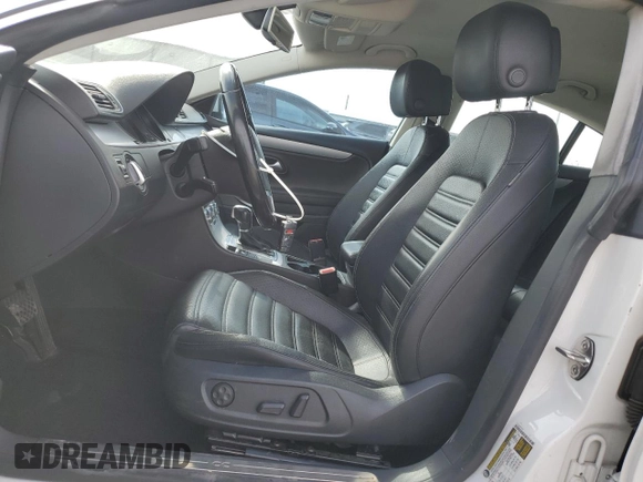 2013 Volkswagen CC Sport with VIN WVWBP7AN9DE567212, listed as a Copart auction lot 52998835 with 127,255 mi miles and Salvage Title. Bid and sale history available at carsss.com. Image 7.