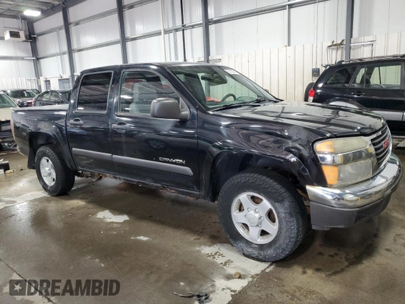 2004 GMC Canyon 1SB SLE Z85 with VIN 1GTDT136348114628, listed as a Copart auction lot 52105615 with 244,232 mi miles and Salvage Title. Bid and sale history available at carsss.com. Image 4.