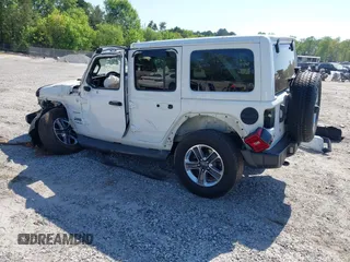 2019 Jeep Wrangler Unlimited Sahara with VIN 1C4HJXEN5KW509806, listed as a IAAI auction lot 42071325 with 95,549 mi miles and . Bid and sale history available at DreamBid. Image 3.