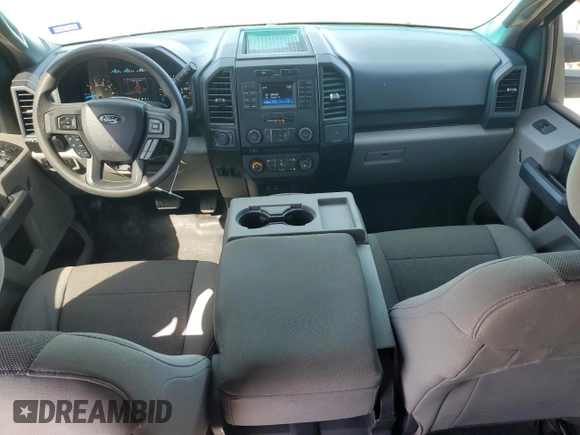 2015 Ford F-150 XLT w/HD Payload Pkg with VIN 1FTFW1EG6FFA02457, listed as a Copart auction lot 52121515 with 242,747 mi miles and Salvage Title. Bid and sale history available at carsss.com. Image 8.