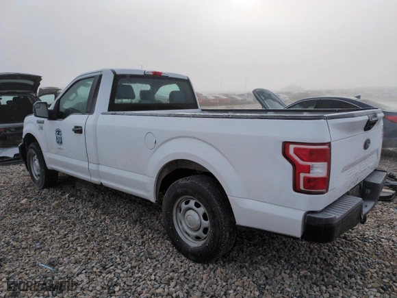 2019 Ford F-150 XL with VIN 1FTMF1CB9KKF27822, listed as a Copart auction lot 82123714 with 103,959 mi miles and Salvage Title. Bid and sale history available at carsss.com. Image 2.