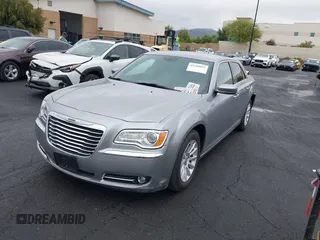 2014 Chrysler 300 with VIN 2C3CCAAG7EH249196, listed as a IAAI auction lot 42180023 with 48,241 mi miles and . Bid and sale history available at DreamBid. Image 2.