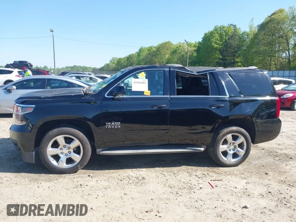 2015 Chevrolet Tahoe LT with VIN 1GNSCBKC8FR268891, listed as a IAAI auction lot 41964602 with 175,035 mi miles and . Bid and sale history available at DreamBid. Image 14.