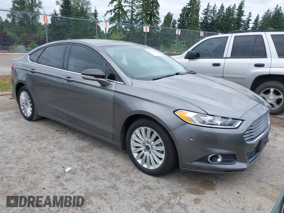 2014 Ford Fusion SE Hybrid with VIN 3FA6P0LU6ER285188, listed as a IAAI auction lot 42516215 with 122,899 mi miles and . Bid and sale history available at DreamBid. Image 1.