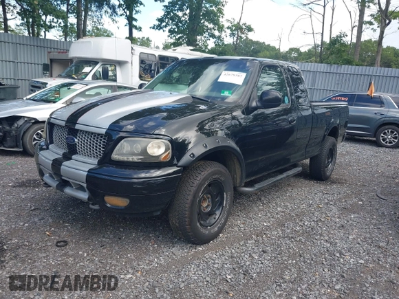 2001 Ford F-150 XLT z VIN 1FTRW08L91KE74815, wystawiony jako IAAI lot #42679387 z przebiegiem 201 258 mil mil oraz . Historia ofert i sprzedaży dostępna na DreamBid. Obrazek 2.