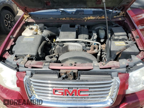 2006 GMC Envoy SLE z VIN 1GKDT13S062310436, wystawiony jako Copart lot #52981735 z przebiegiem 255 225 mil mil oraz Czysty tytuł • Clean title. Historia ofert i sprzedaży dostępna na DreamBid. Obrazek 12.