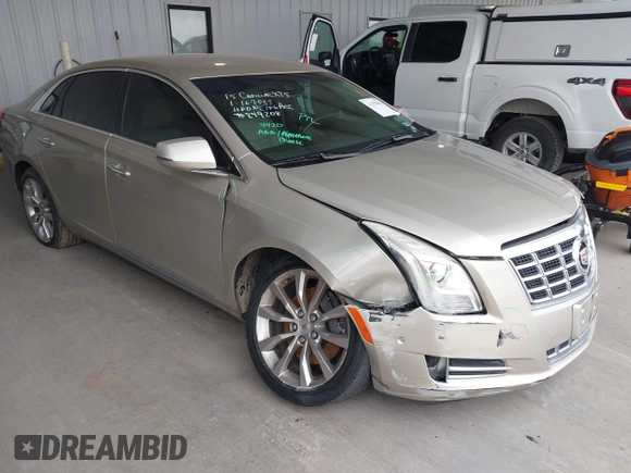 2015 Cadillac XTS Luxury z VIN 2G61M5S39F9246298, wystawiony jako IAAI lot #41555093 z przebiegiem 126 928 mil mil oraz . Historia ofert i sprzedaży dostępna na DreamBid. Obrazek 1.