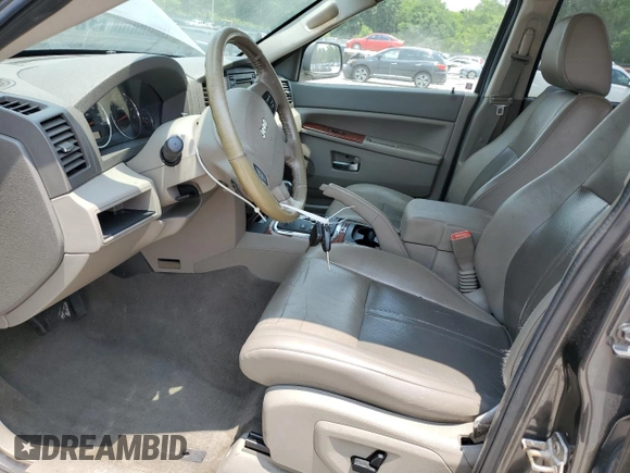 2005 Jeep Grand Cherokee Limited z VIN 1J8HR58245C680060, wystawiony jako Copart lot #59271075 z przebiegiem 263 384 mil mil oraz Czysty tytuł • Clean title. Historia ofert i sprzedaży dostępna na DreamBid. Obrazek 7.