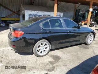 2014 BMW 3 Series 335i xDrive with VIN WBA3B9G53ENR90601, listed as a Copart auction lot 48493275 with 129,992 mi miles and Salvage Title. Bid and sale history available at carsss.com. Image 3.