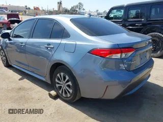 2020 Toyota Corolla Hybrid LE with VIN JTDEBRBE9LJ011672, listed as a IAAI auction lot 41832275 with 118,835 mi miles. Bid and sale history available at carsss.com. Image 3.