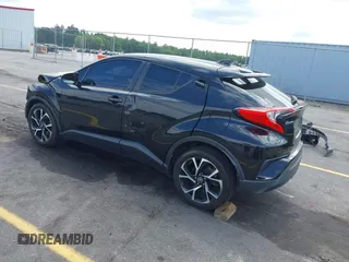 2019 Toyota C-HR XLE with VIN NMTKHMBX4KR096569, listed as a IAAI auction lot 42147017 with 111,569 mi miles and . Bid and sale history available at DreamBid. Image 3.