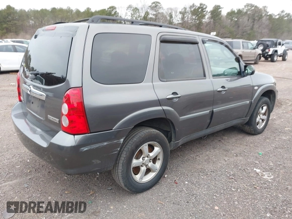 2006 Mazda Tribute S with VIN 4F2YZ04196KM12510, listed as a IAAI auction lot 41382627 with 242,650 mi miles and . Bid and sale history available at DreamBid. Image 12.