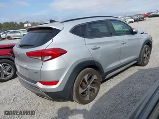2018 Hyundai Tucson Value with VIN KM8J3CA21JU816783, listed as a IAAI auction lot 41716795 with 84,580 mi miles. Bid and sale history available at carsss.com. Image 4.