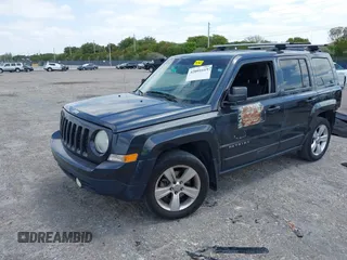 2014 Jeep Patriot Latitude with VIN 1C4NJPFA4ED604145, listed as a IAAI auction lot 42091619 with 81,119 mi miles and . Bid and sale history available at carsss.com. Image 18.