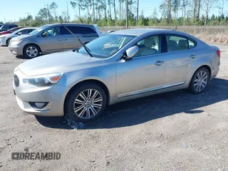 2014 Kia Cadenza Premium with VIN KNALN4D7XE5159404, listed as a IAAI auction lot 41811236 with 108,666 mi miles. Bid and sale history available at carsss.com. Image 2.