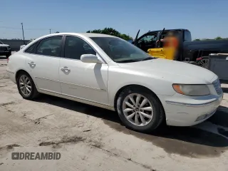 2006 Hyundai Azera SE z VIN KMHFC46F56A098008, wystawiony jako Copart lot #51842105 z przebiegiem 129 476 mil mil oraz Tytuł czysty. Historia ofert i sprzedaży dostępna na DreamBid. Obrazek 4.