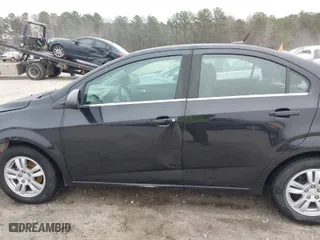2013 Chevrolet Sonic LT with VIN 1G1JC5SB2D4246093, listed as a IAAI auction lot 41504226 with 132,272 mi miles. Bid and sale history available at carsss.com. Image 14.