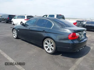 2007 BMW 3 Series 335i with VIN WBAVB73507VF54233, listed as a IAAI auction lot 39816172 with 96,076 mi miles. Bid and sale history available at carsss.com. Image 3.