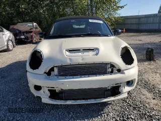 2015 MINI Roadster S z VIN WMWSY3C56FT595466, wystawiony jako Copart lot #69655944 z przebiegiem 53 971 mil mil oraz Szkody całkowita. Historia ofert i sprzedaży dostępna na DreamBid. Obrazek 5.