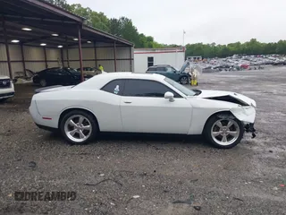 2015 Dodge Challenger SXT with VIN 2C3CDZAG2FH701634, listed as a IAAI auction lot 42242521 with 153,379 mi miles and . Bid and sale history available at DreamBid. Image 14.