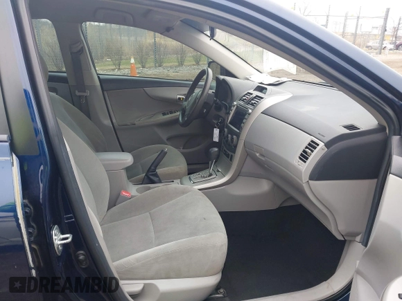 2012 Toyota Corolla L with VIN 5YFBU4EE4CP031190, listed as a IAAI auction lot 42015131 with 210,689 mi miles. Bid and sale history available at carsss.com. Image 5.